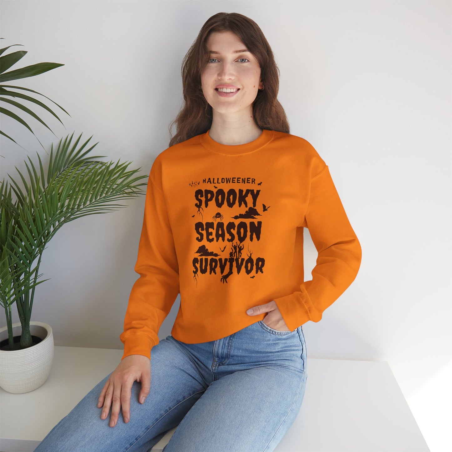 'Spooky Season Survivor' Unisex Heavy Blend™ Crewneck Sweatshirt.