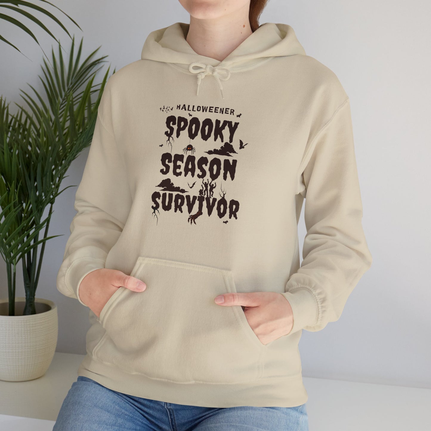 "Spooky Season Survivor"  Unisex Heavy Blend™ Hooded Sweatshirt.