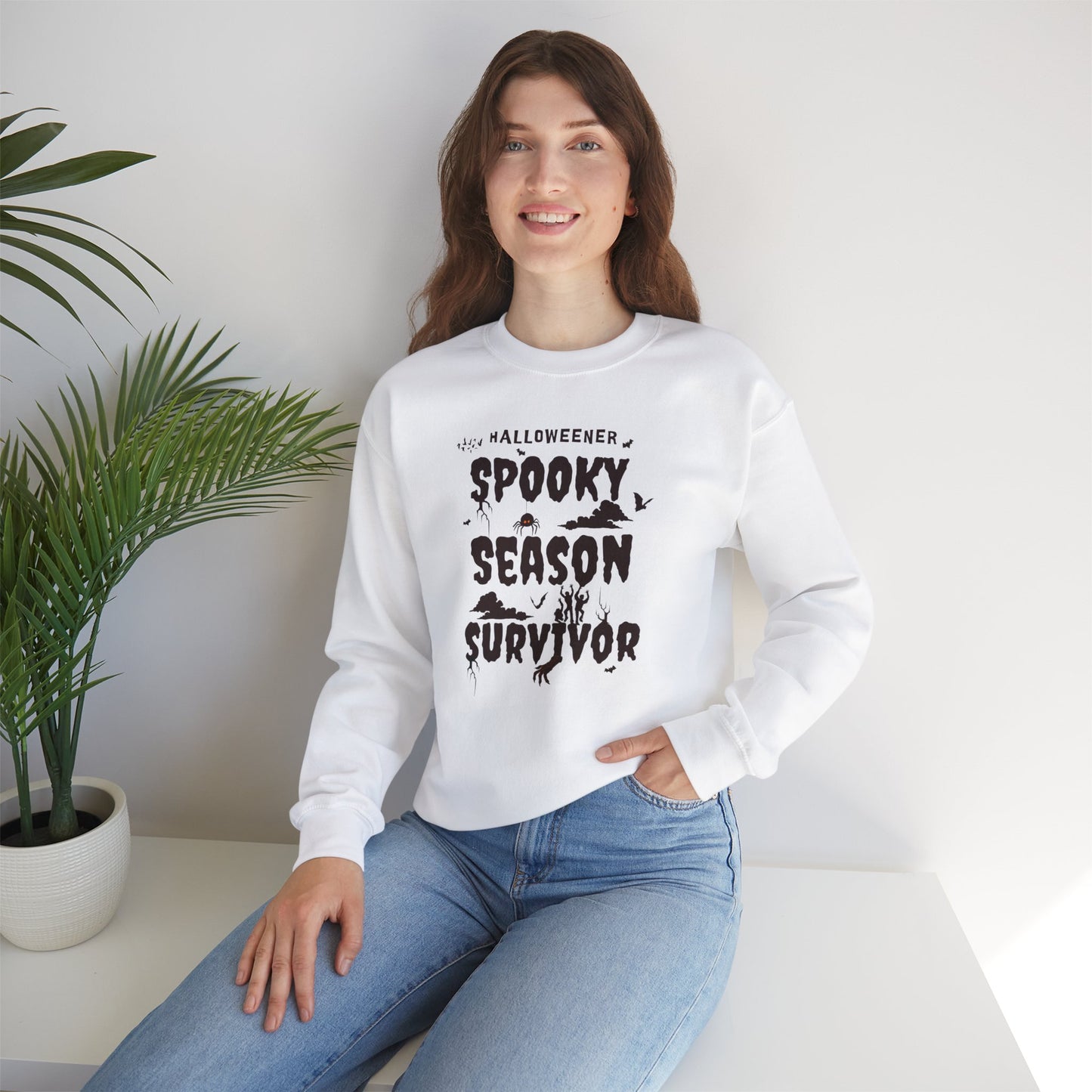 'Spooky Season Survivor' Unisex Heavy Blend™ Crewneck Sweatshirt.