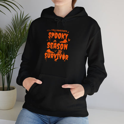 'Spooky Season Survivor' Unisex Heavy Blend™ Hooded Sweatshirt.