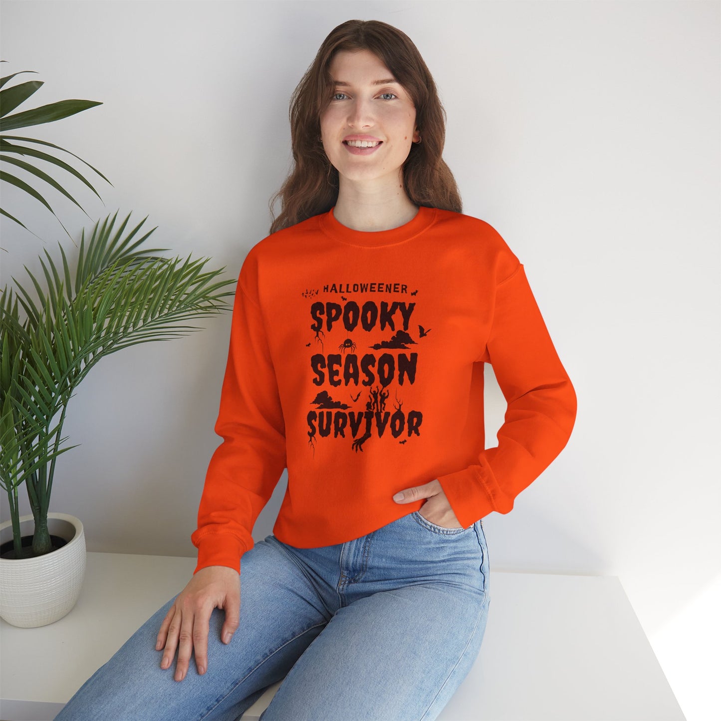 'Spooky Season Survivor' Unisex Heavy Blend™ Crewneck Sweatshirt.