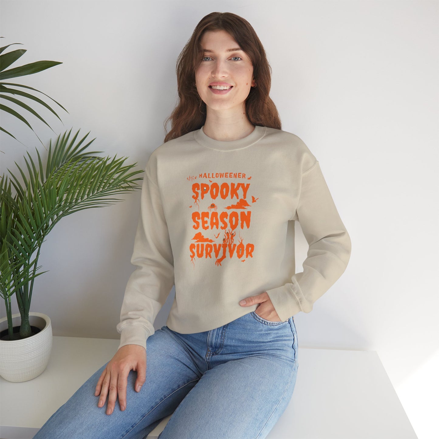 'Spooky Season Survivor' Unisex Heavy Blend™ Crewneck Sweatshirt.