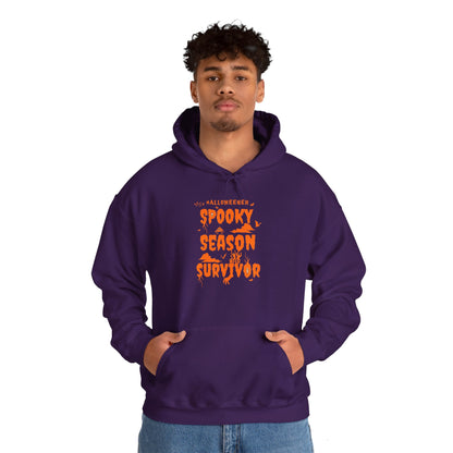 'Spooky Season Survivor' Unisex Heavy Blend™ Hooded Sweatshirt.