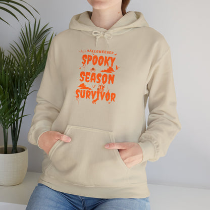 'Spooky Season Survivor' Unisex Heavy Blend™ Hooded Sweatshirt.