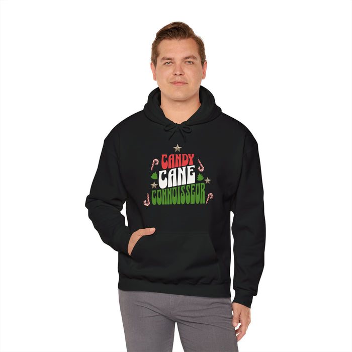 'Candy Cane Conneiseur' Unisex Heavy Blend™ Hooded Sweatshirt.