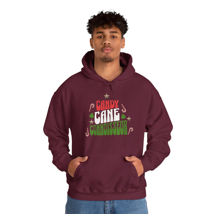 'Candy Cane Conneiseur' Unisex Heavy Blend™ Hooded Sweatshirt.