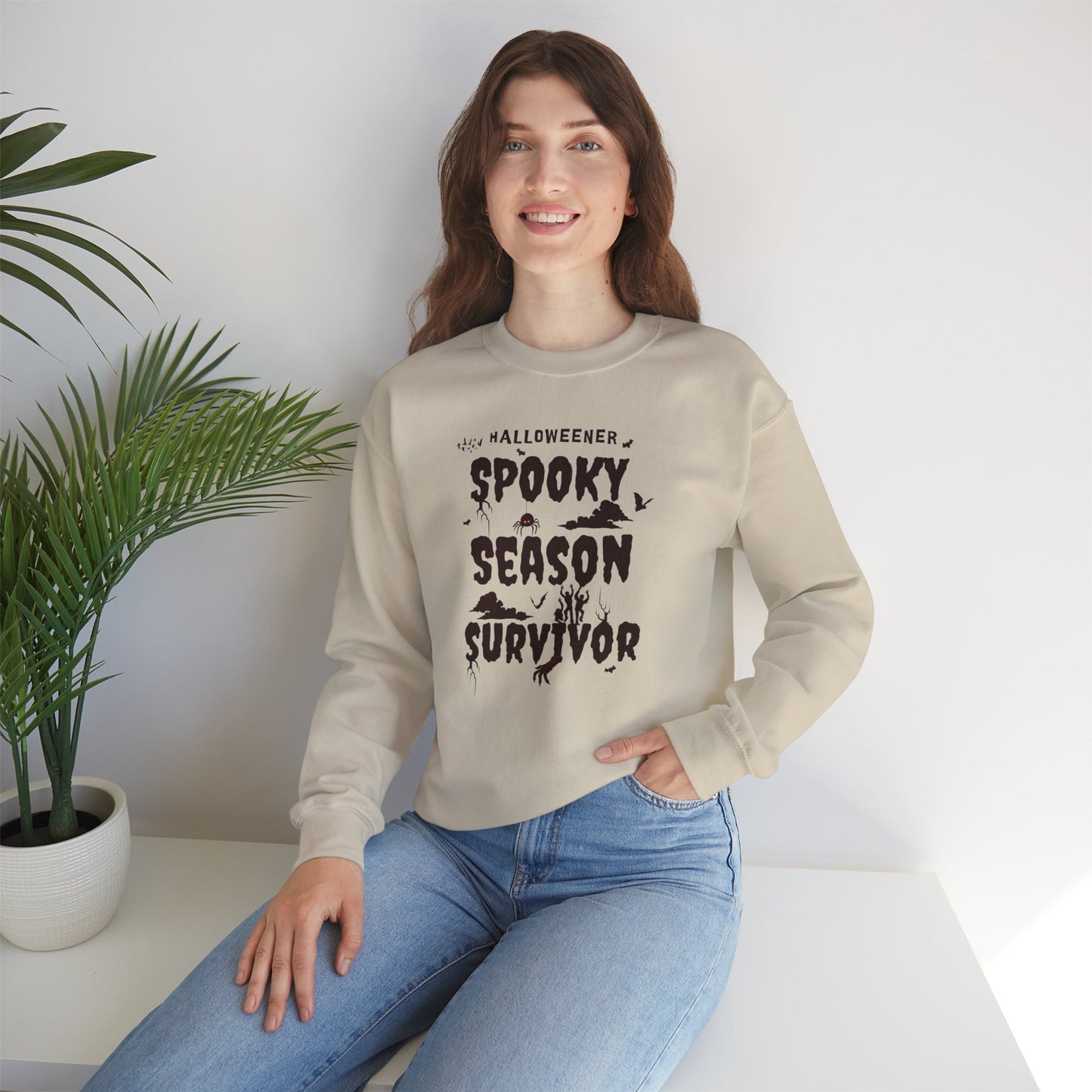 'Spooky Season Survivor' Unisex Heavy Blend™ Crewneck Sweatshirt.