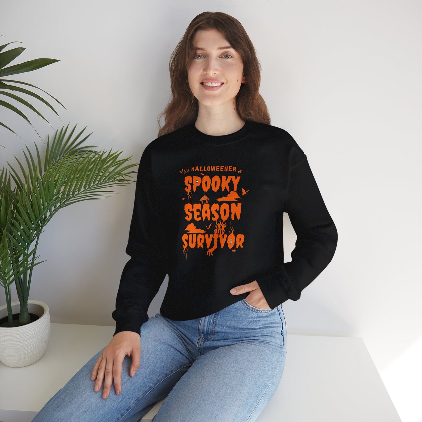 'Spooky Season Survivor' Unisex Heavy Blend™ Crewneck Sweatshirt.