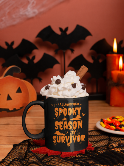 'Halloweener- Spooky Season Survivor' Black Mug. (15oz)