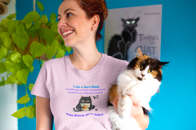 'I am a Cat's Mom, Couldn't Get a Better Resemblance of Myself in My Child and I Love it!...Vote Harris - Walz 2024!' Unisex Ultra Cotton Tee.