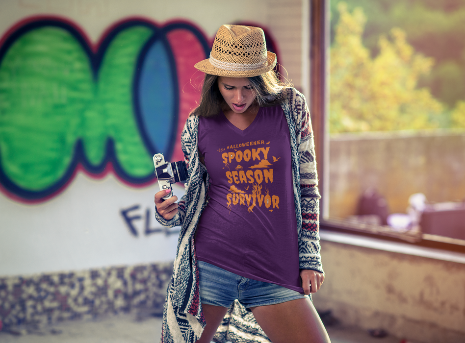 'Spooky Season Survivor' Unisex Jersey Short Sleeve V-Neck Tee.