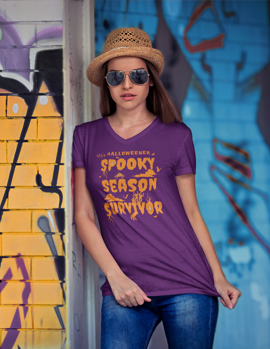 'Spooky Season Survivor' Unisex Jersey Short Sleeve V-Neck Tee.