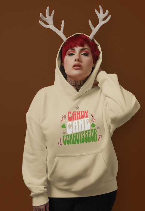 'Candy Cane Conneiseur' Unisex Heavy Blend™ Hooded Sweatshirt.